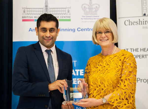 Patsy Kane OBE MA receives an award for contributions to the local community