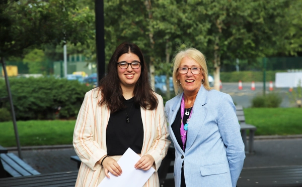 Student celebrating her results with Mrs J. Fahey, Academy Headteacher, on Sixth Form Results Day 2023