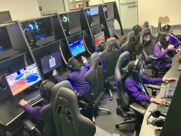 Students in the custom-built gaming arena at HOST, Salford's Home of Skills and Technology, in December 2023