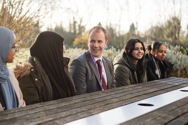 Students with the Head of Sixth Form