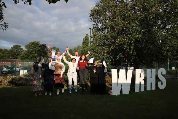Students celebrate their results on Sixth Form Results Day 2025
