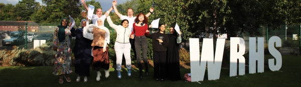 Students celebrate their results on Sixth Form Results Day 2025
