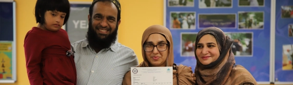 A student celebrates their results on Sixth Form Results Day 2025